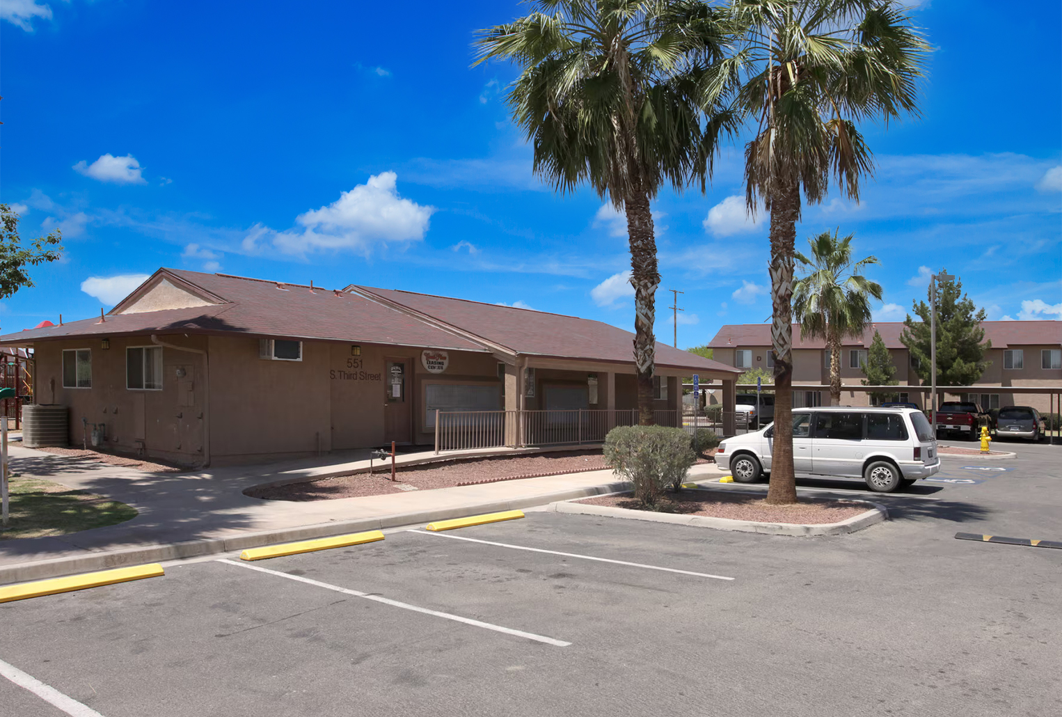 This image displays the pool area at Quail Place Apartments.