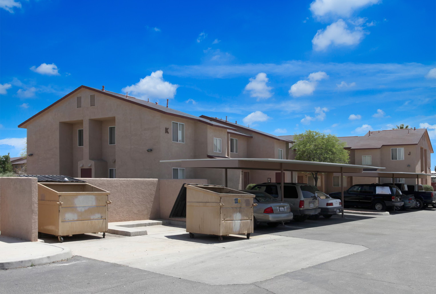 This image displays the exterior of Quail Place Apartments.